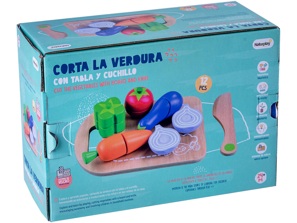 Couper les légumes avec un couteau et une planche en bois