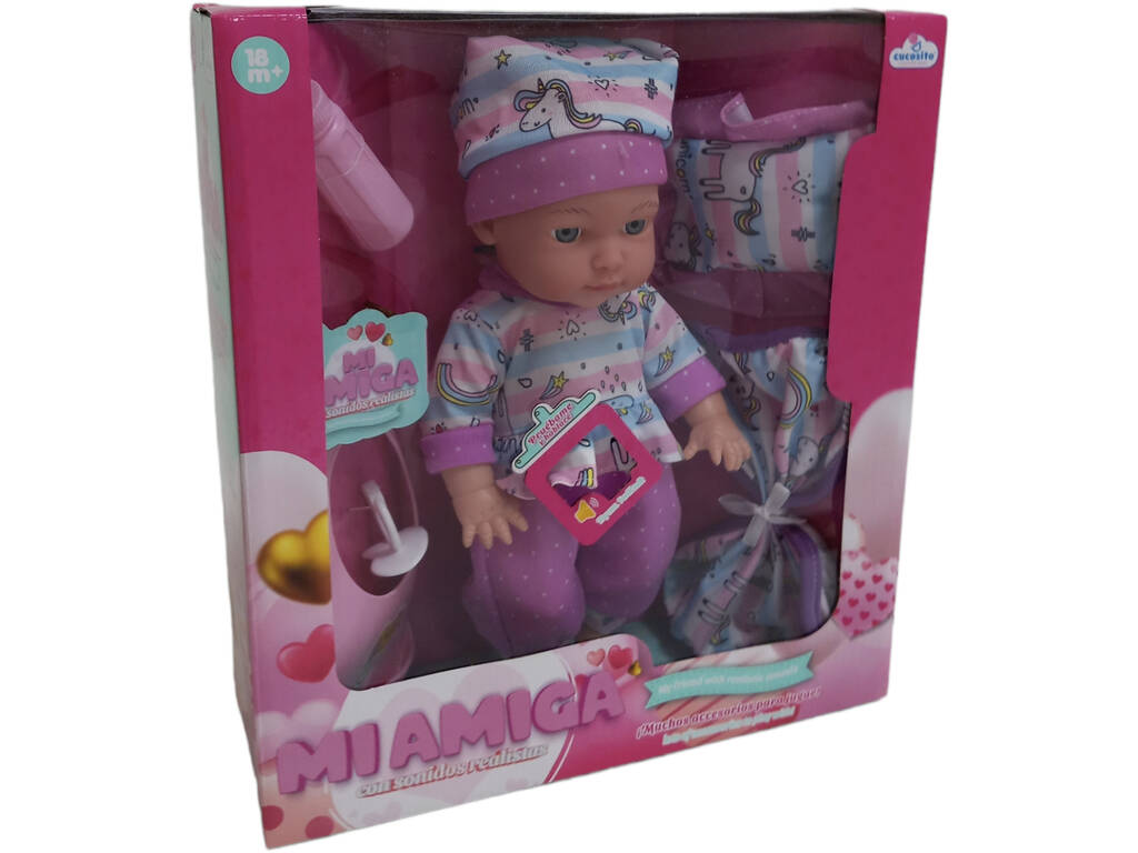 Poupée 28 cm. avec sons et accessoires