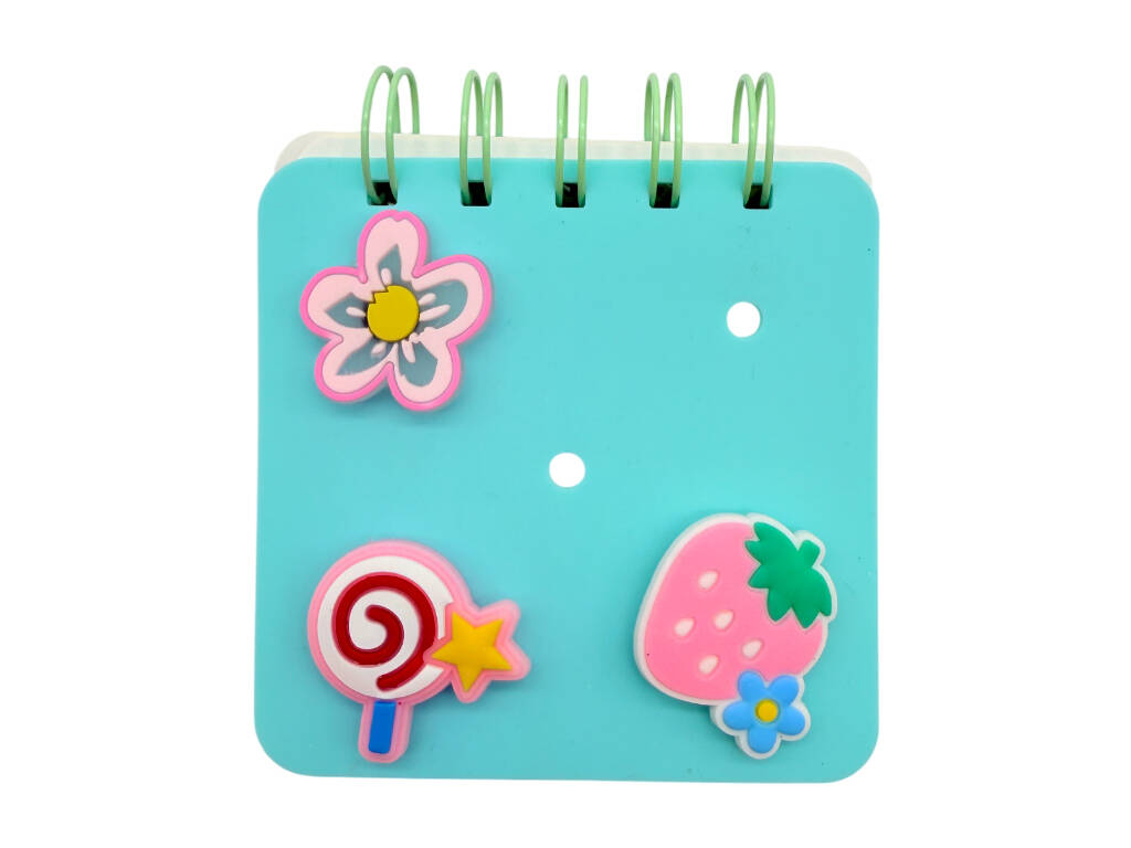 Taccuino A7 blu perforato con 50 pagine e 3 spille decorative.